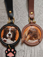 Custom-made luxury leather pet keepsakes and gifts featuring pet portraits, including cat and dog keychains.